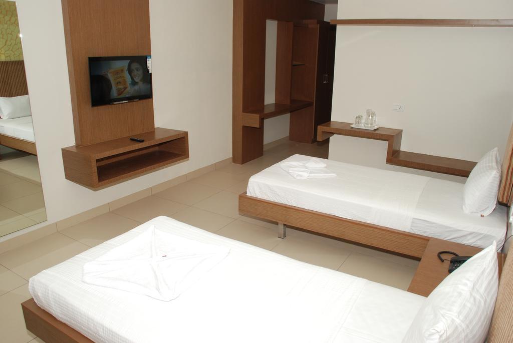 Hotel Pla Amrith Inn Tiruchirappalli Quarto foto